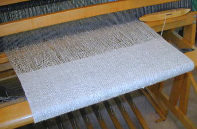 Cloth being woven
